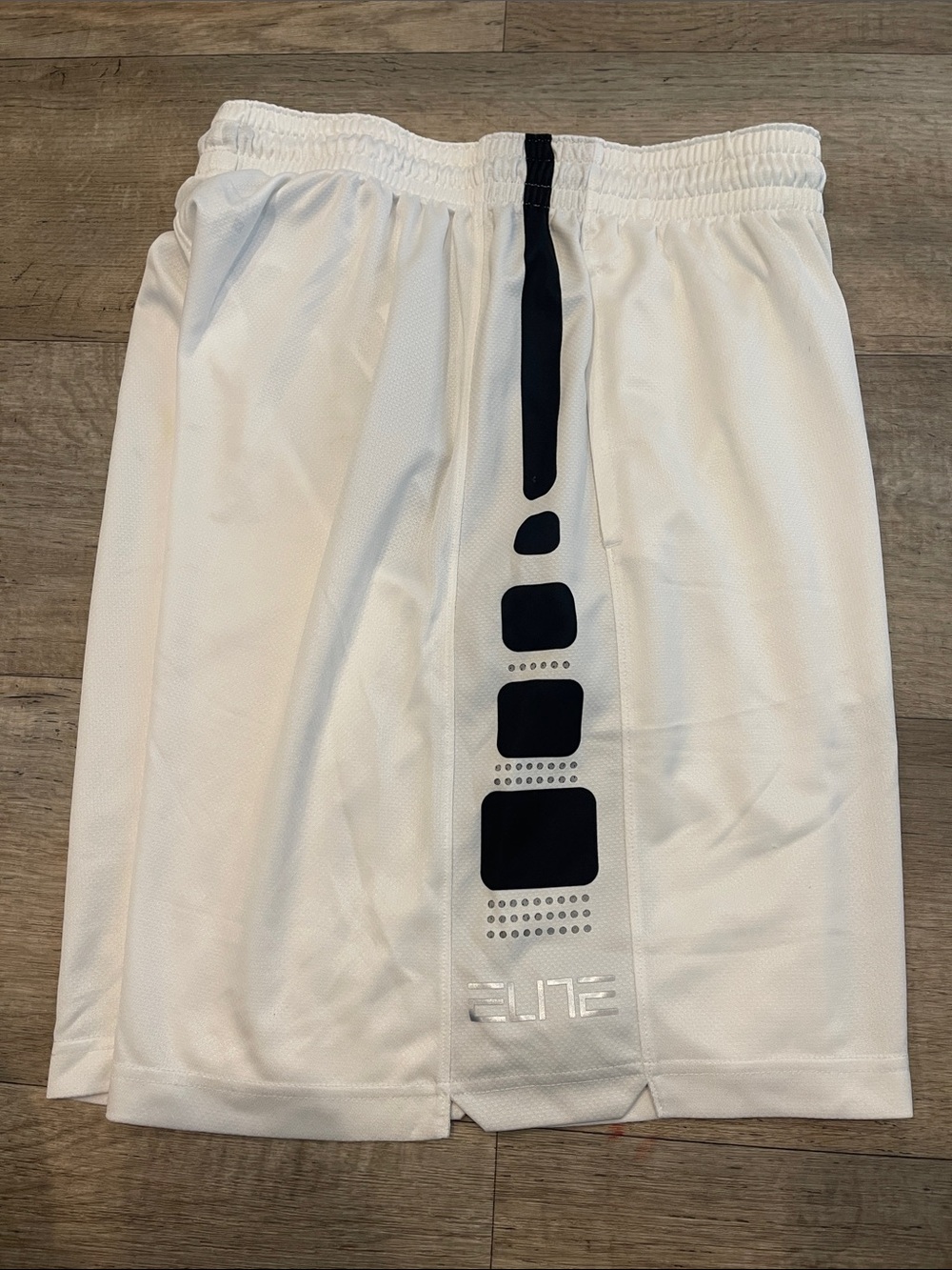 Nike White Athletic Shorts with Black Vertical Detail